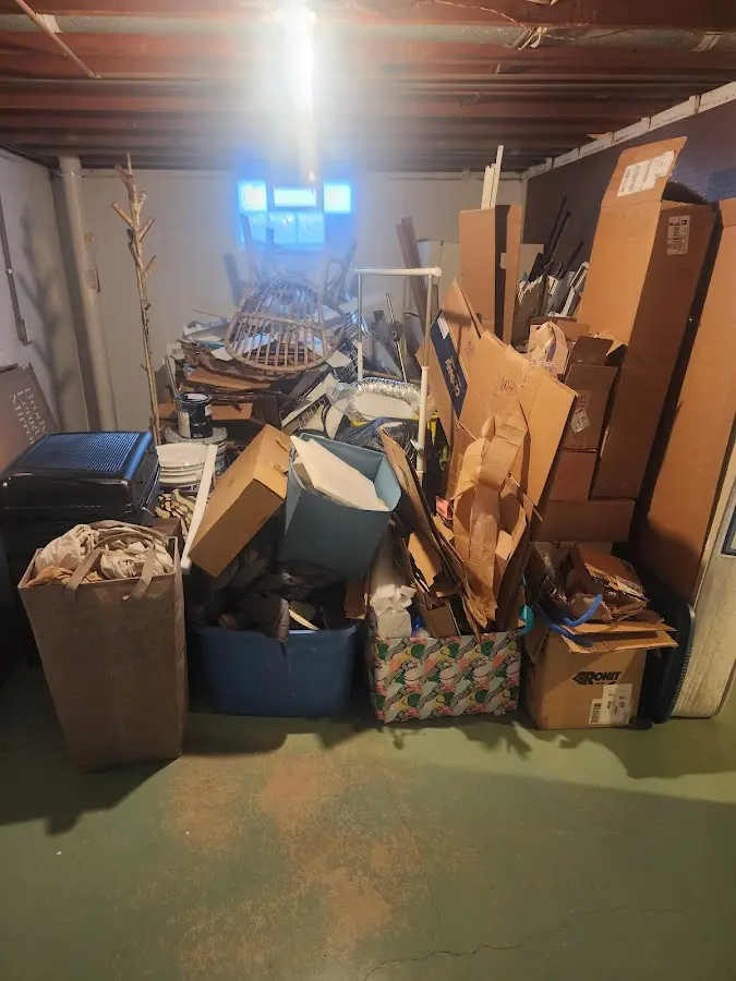 Roll-off dumpster container at job site for 2 Yard Dumpster Rental in Fuquay